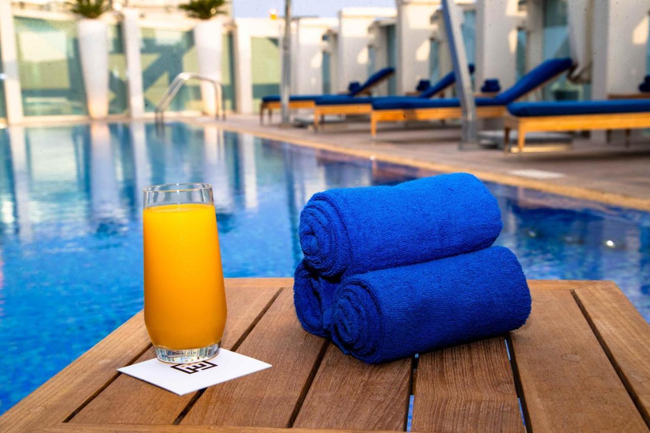 Shaza Doha Hotel Exterior foto Pool at the Hilton